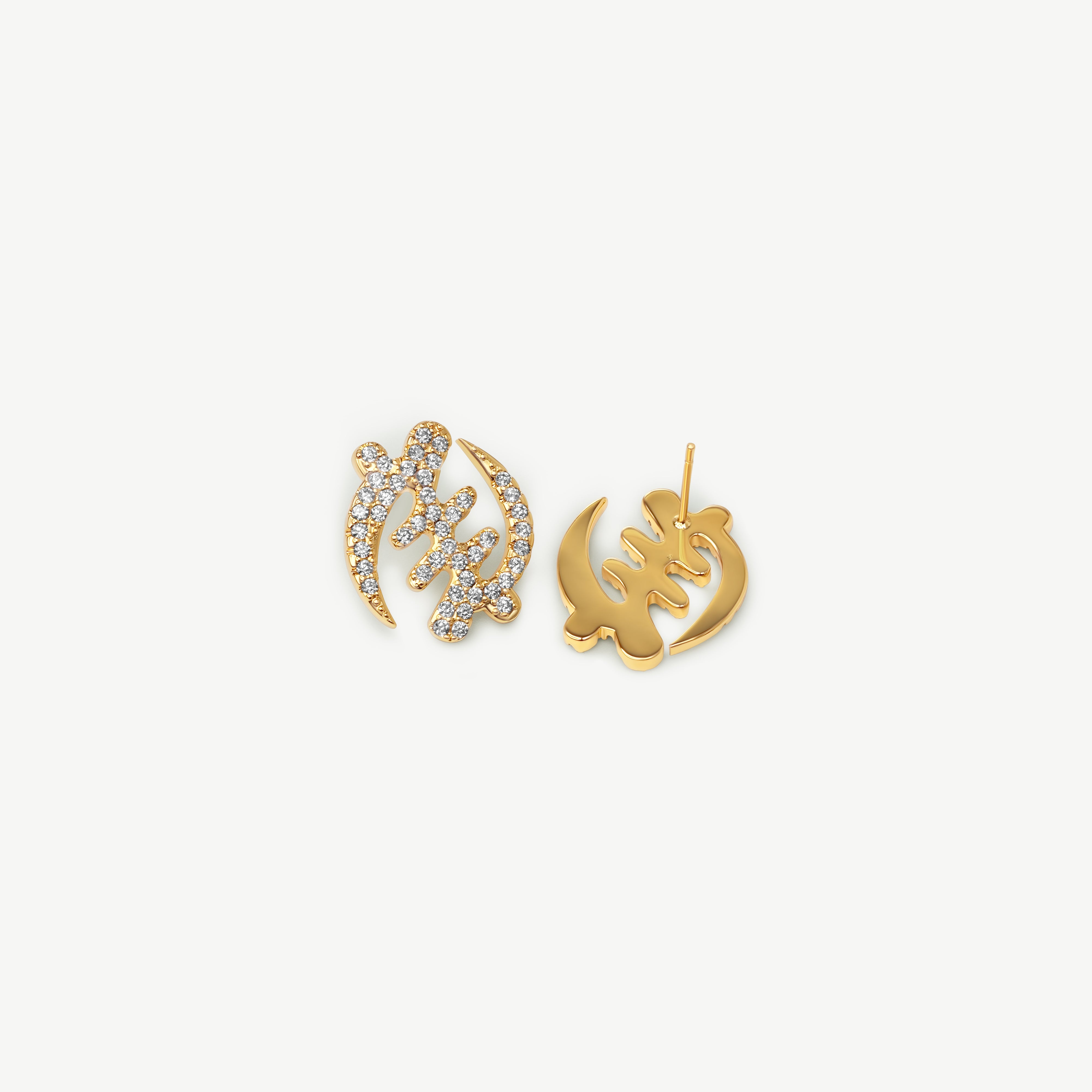 Pair of gold Gye Nyame Adinkra symbol stud earrings, one showing the front with pavé-set high-grade zircon stones and one showing the smooth gold back and post.