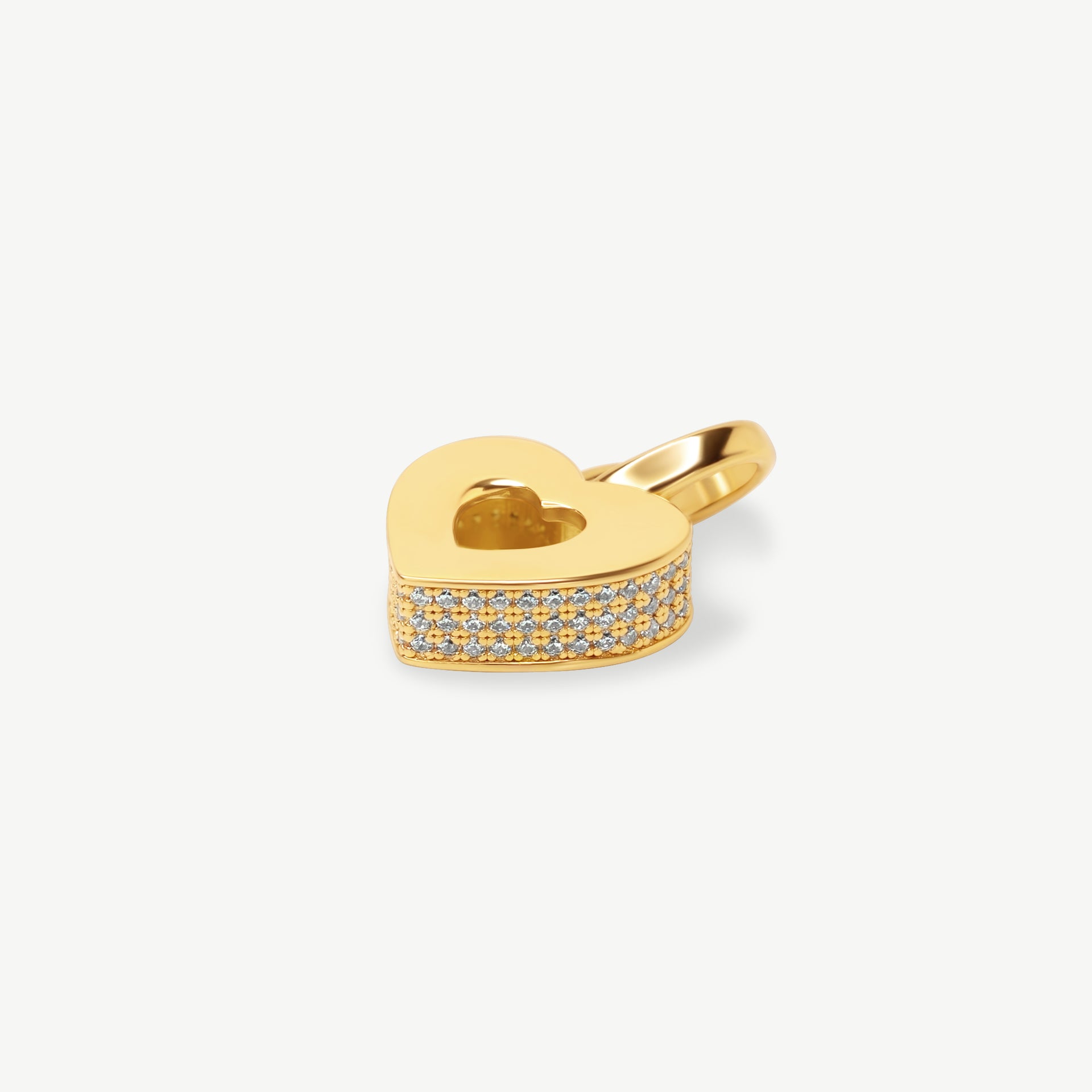 Gold vermeil Akoma heart charm featuring an open-heart design with brilliant high-grade zircon stones pavé-set along the outer edges.