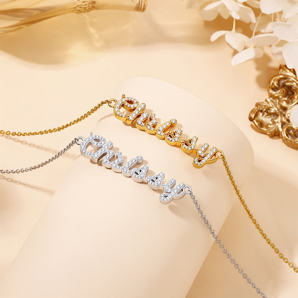 CASA London Custom Pavé Name Necklace shown in both finishes — 18ct gold vermeil and rhodium silver — crafted on an S925 sterling silver base with hand-set moissanite stones