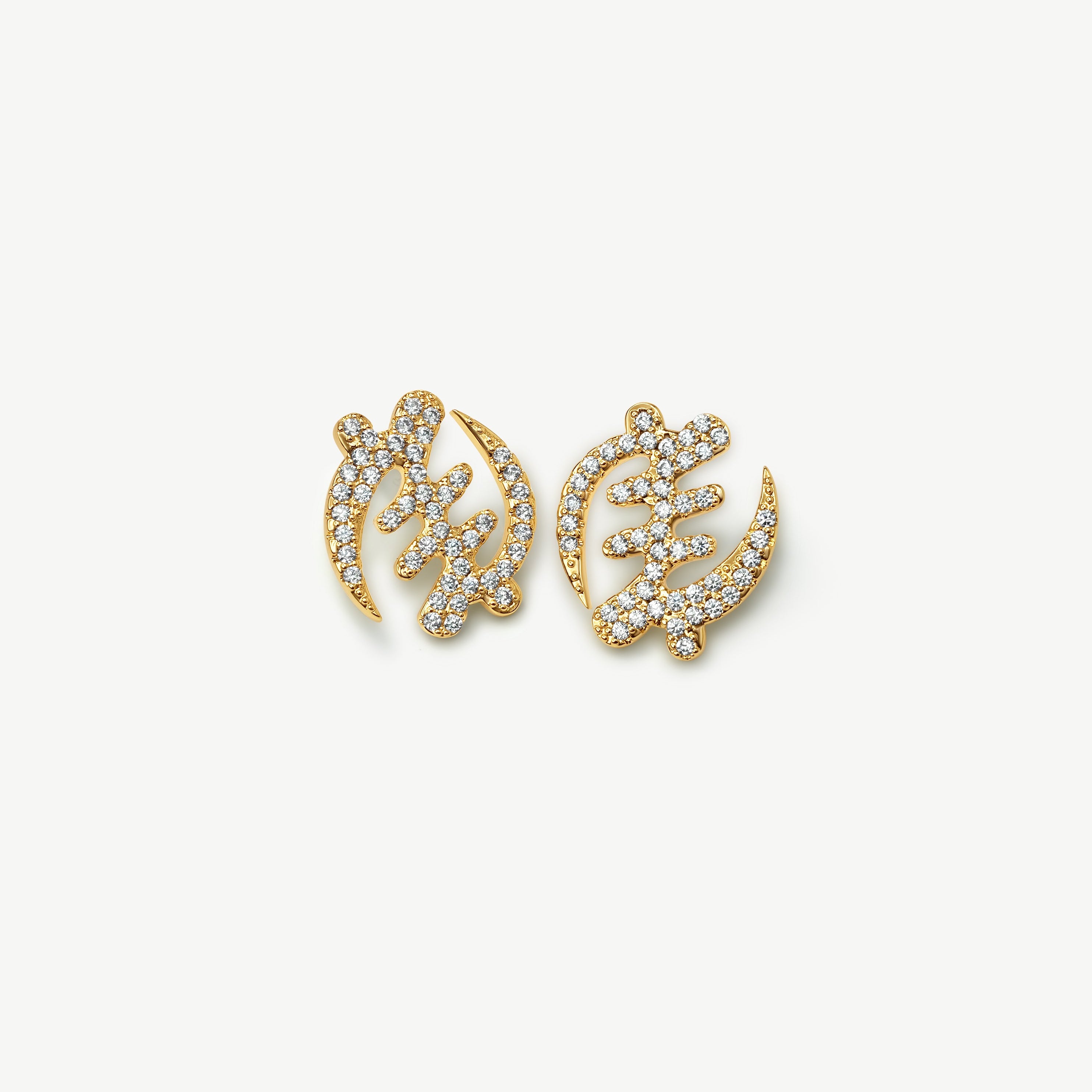Pair of gold Gye Nyame Adinkra symbol stud earrings, showing the front with pavé-set high-grade zircon stones.